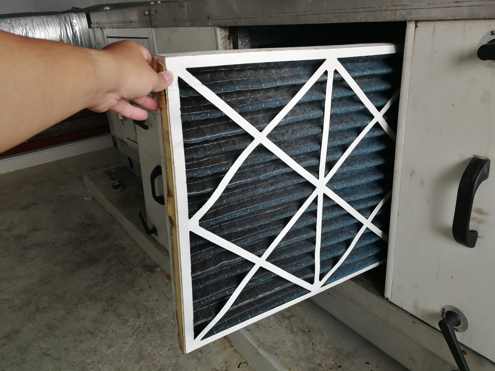 changing furnace filter to protect HVAC system